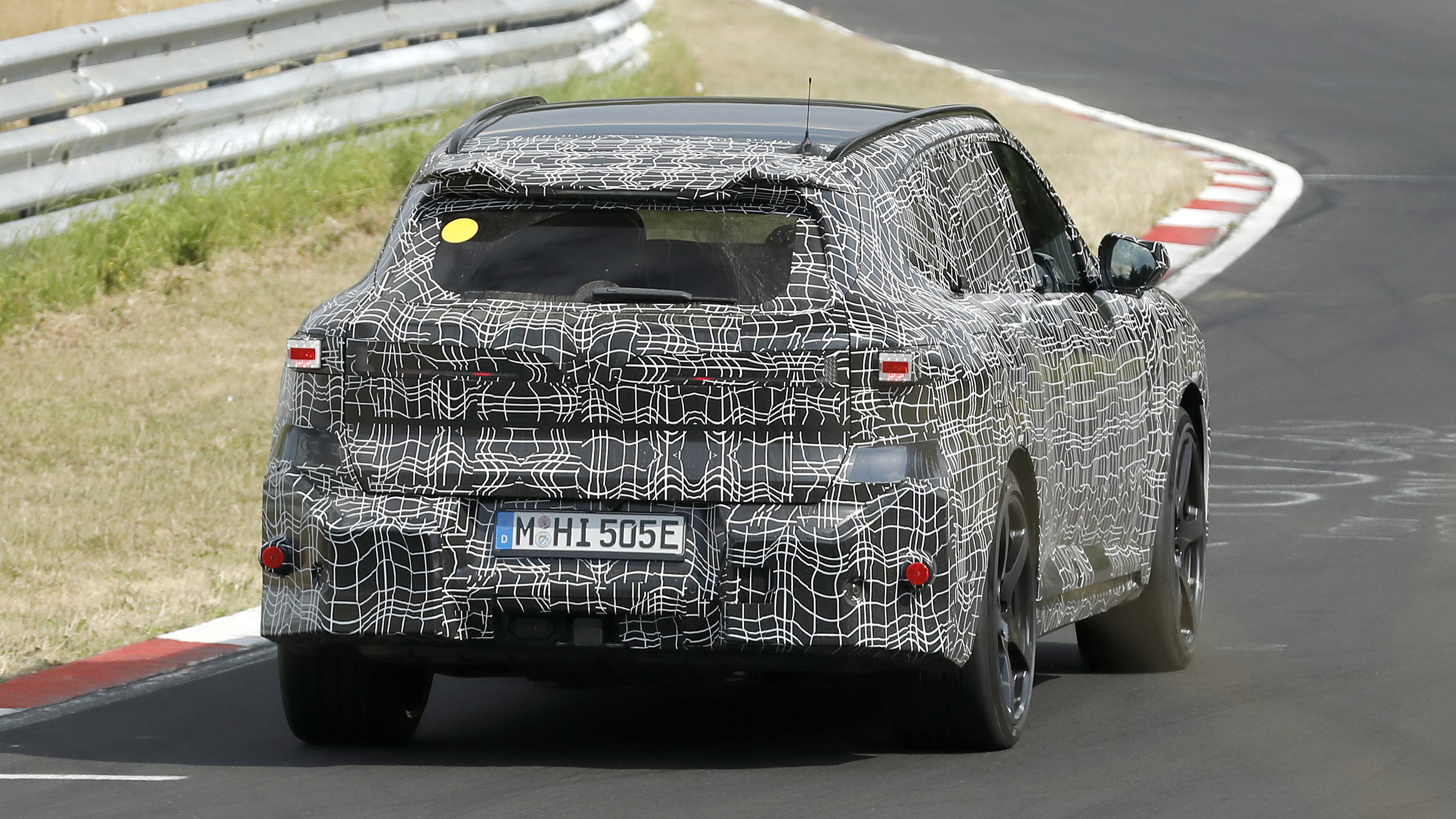 New BMW iX5 M at the Nurburgring - rear action 