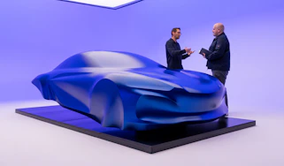 Alpine A110 EV sculpture - Auto Express news reporter Ellis Hyde speaking to Antony Villain, designer, front