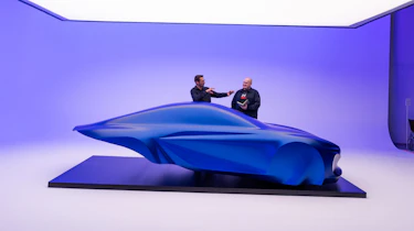 Alpine A110 EV sculpture - Auto Express news reporter Ellis Hyde speaking to Antony Villain, designer, side profile