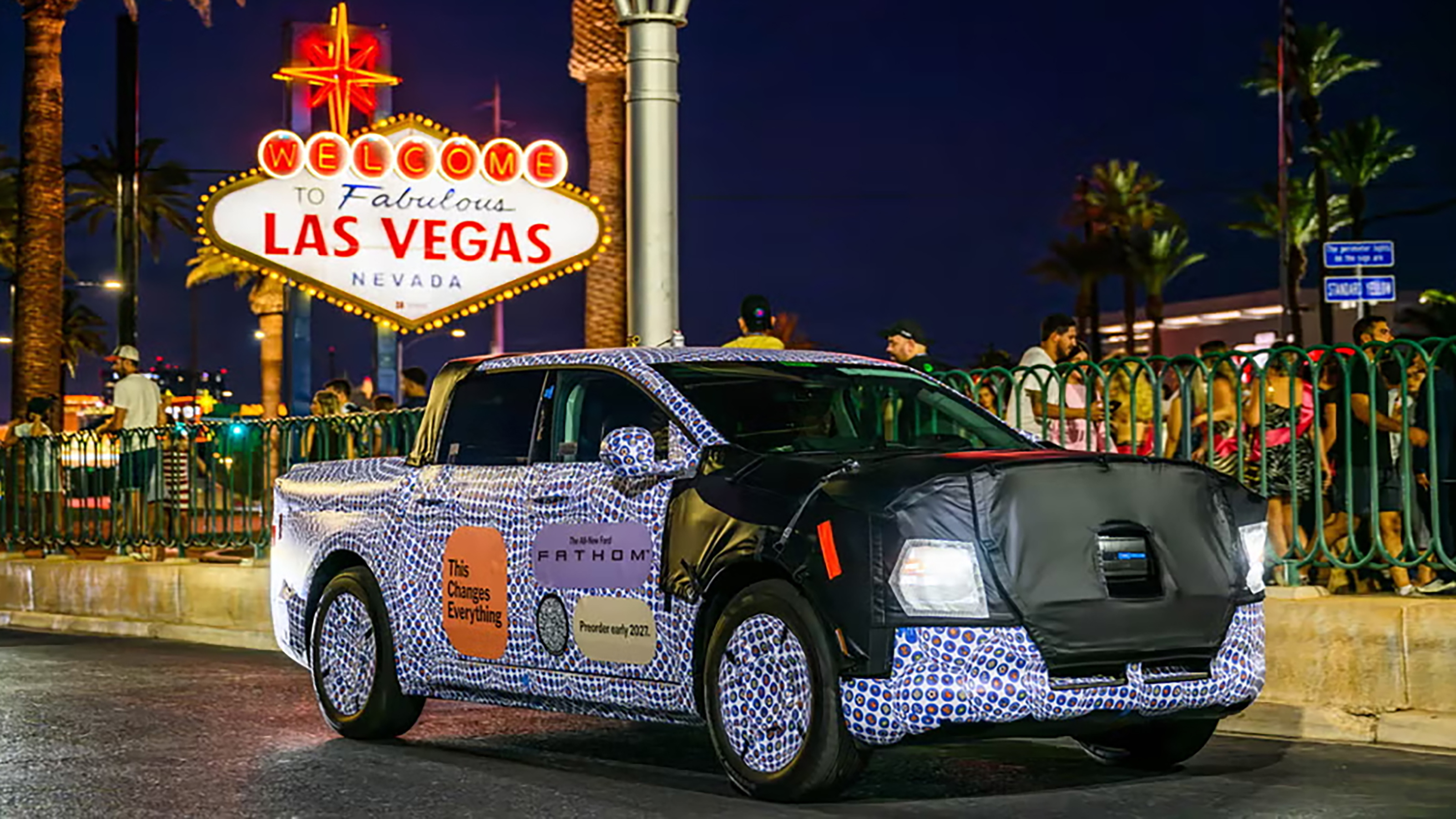 Ford Fathom prototype driving past the Las Vegas sign