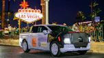 Ford Fathom prototype driving past the Las Vegas sign