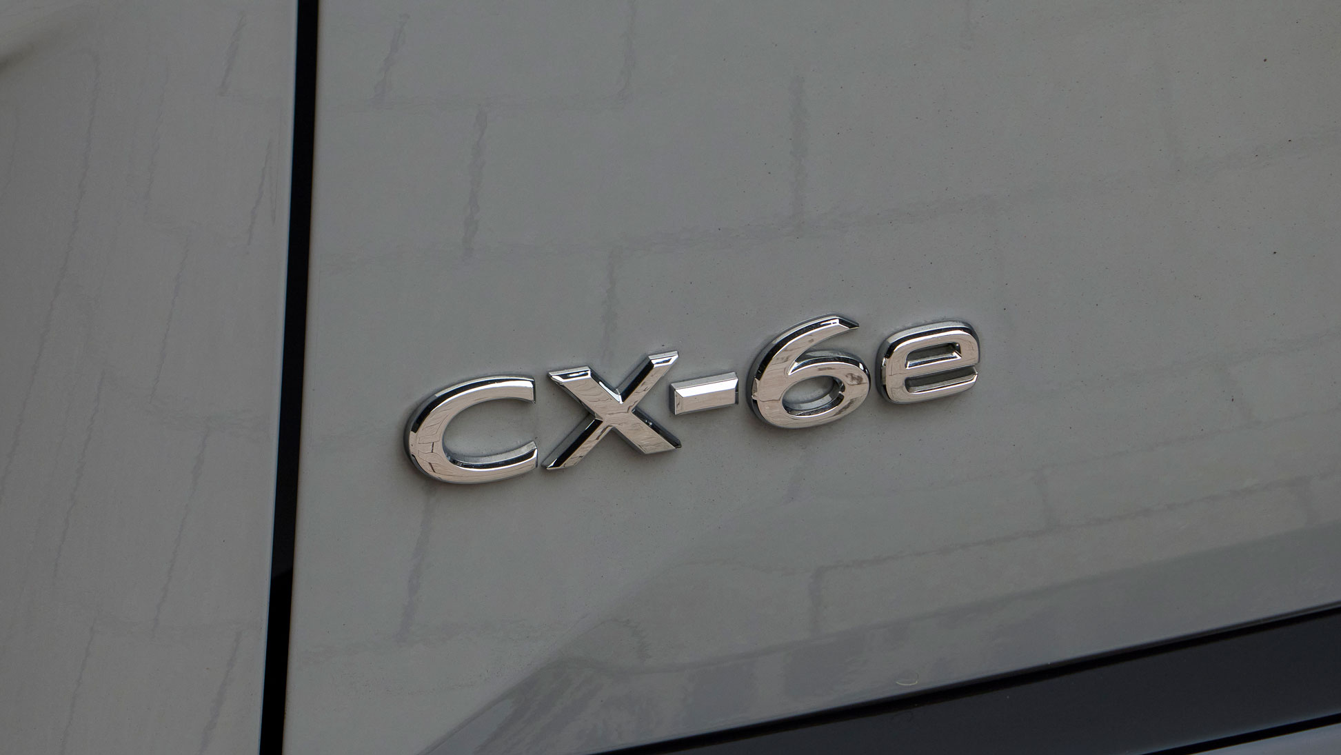 Mazda CX-6e - rear badge