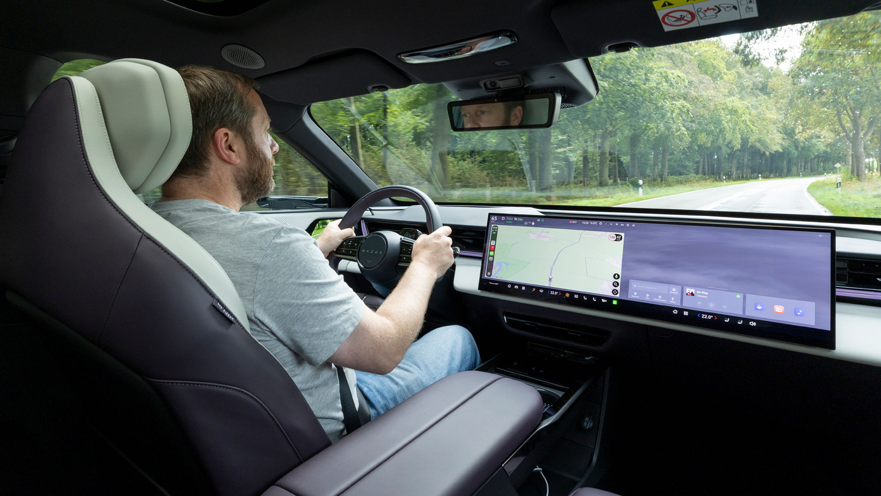Dave Humphreys driving the Mazda CX-6e