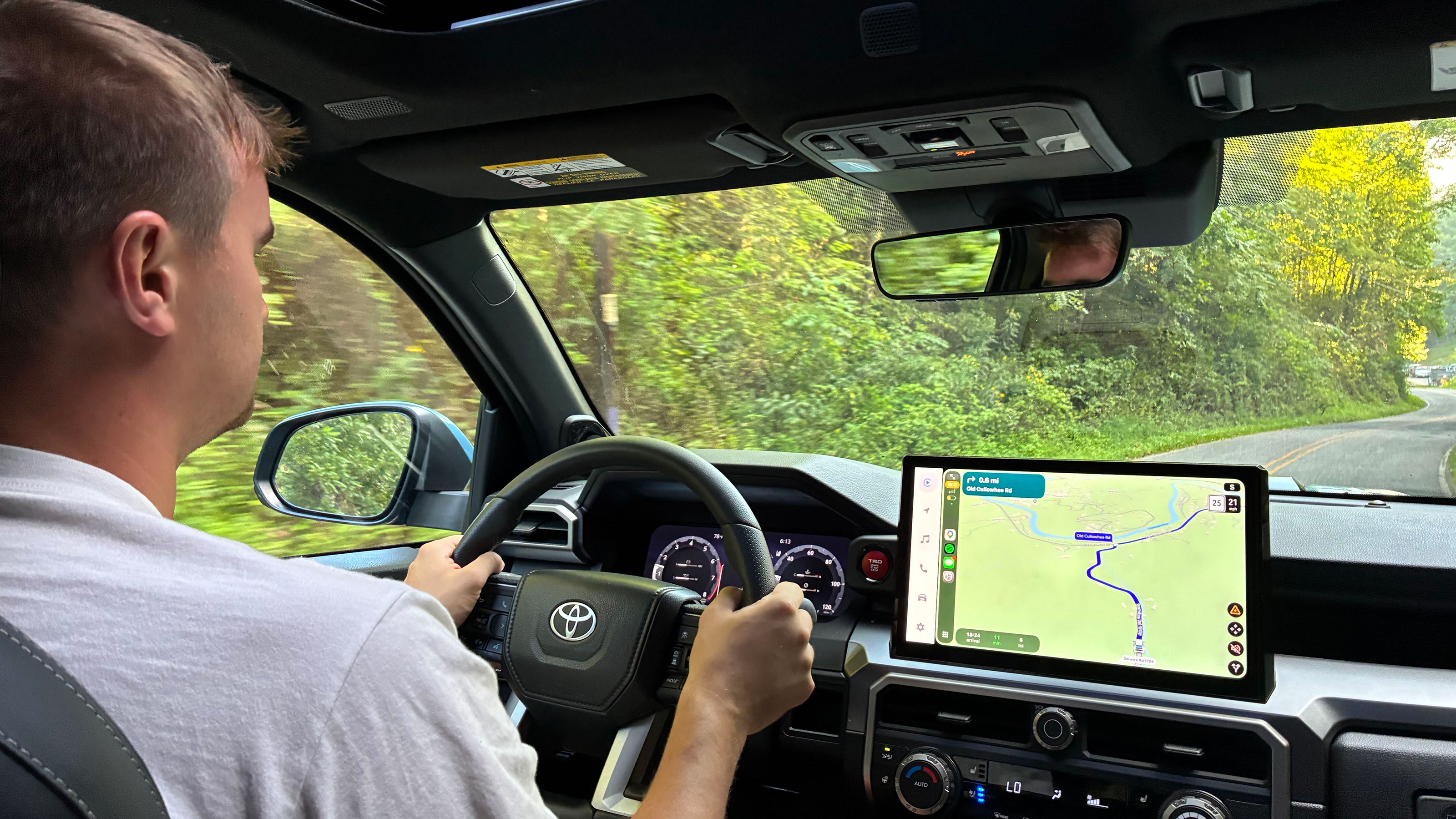 Auto Express senior news reporter Alastair Crooks driving the Toyota 4Runner