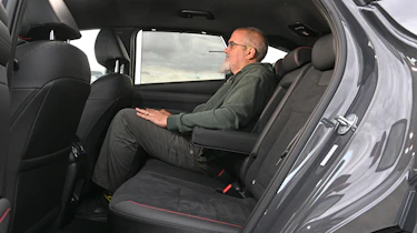 Auto Express senior road test editor Dean Gibson sitting in the Hyundai Tucson's rear seat