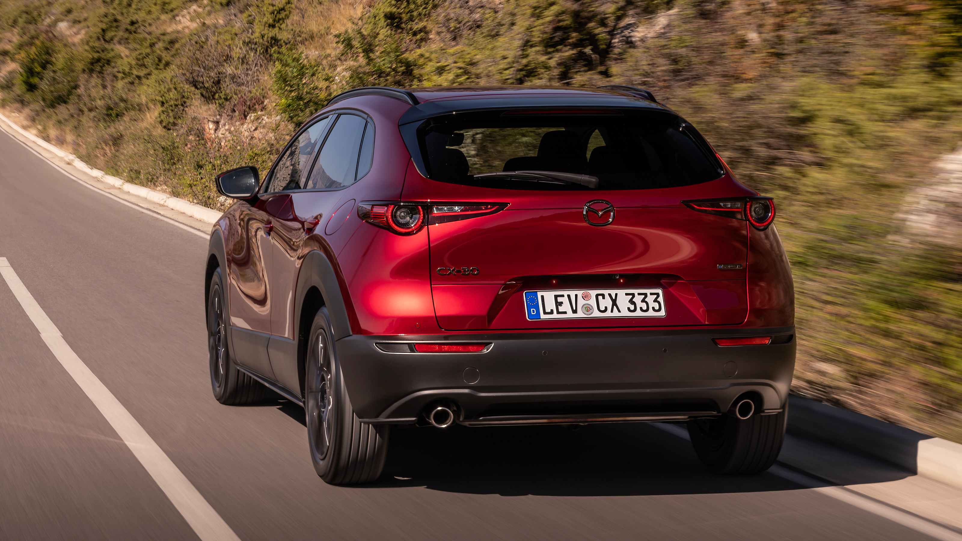 2027 Mazda CX-30 - red rear 3/4