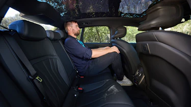 Alastair Crooks sat in the BMW i3
