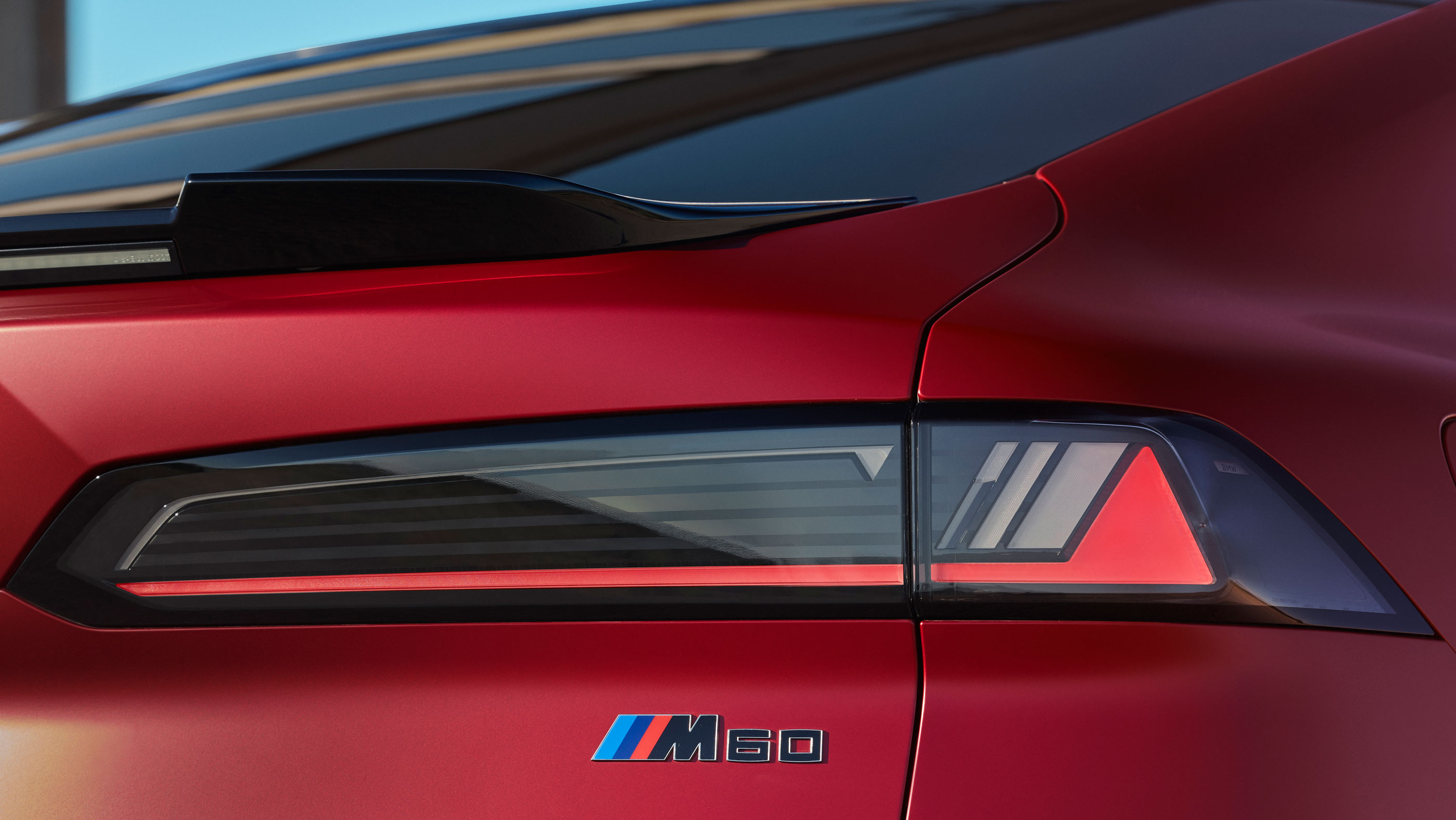 BMW iX4 M60 - rear badge