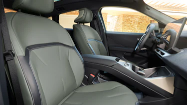 BMW iX4 50 - front seats