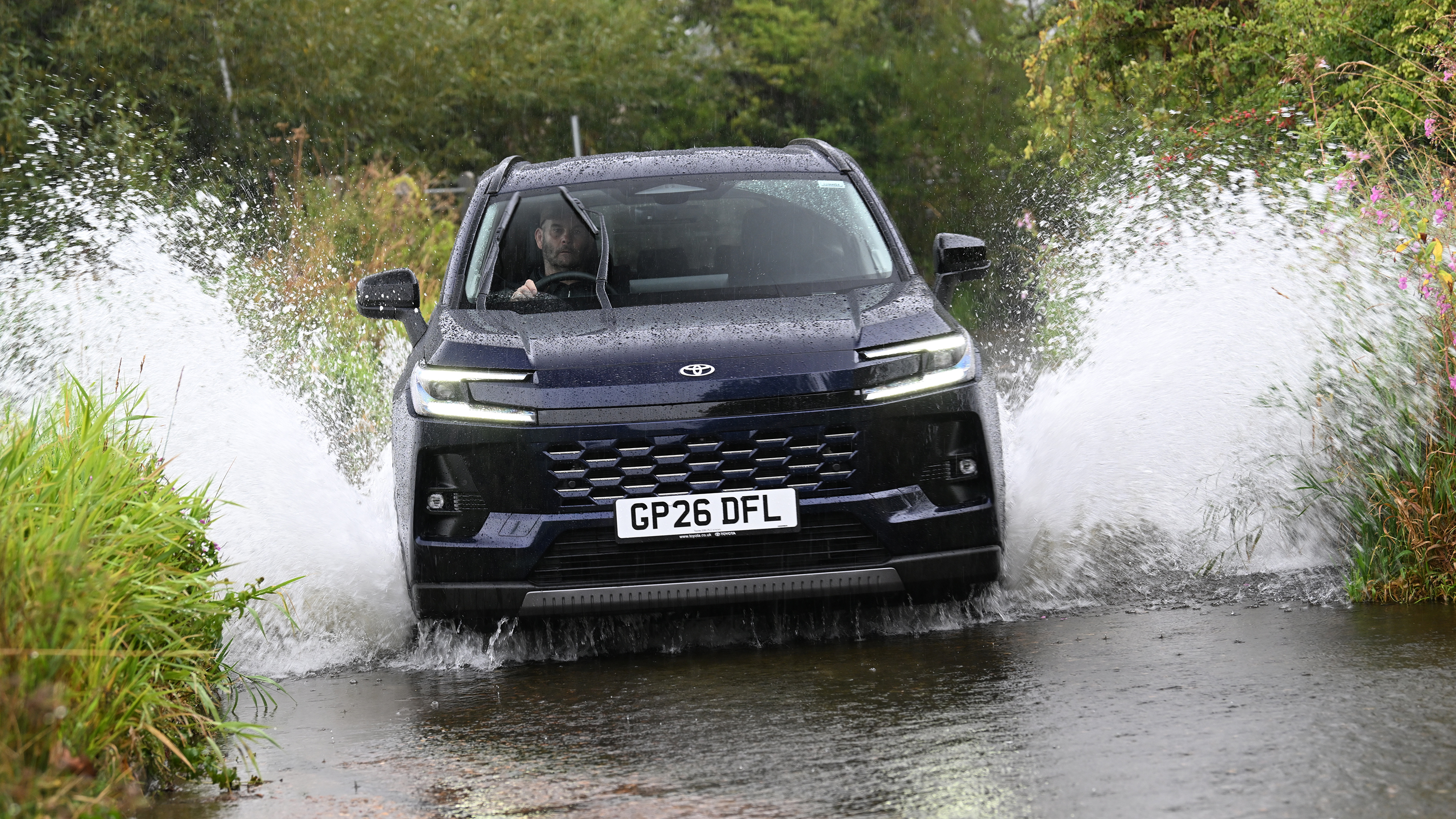 Toyota RAV4 driving through deep water
