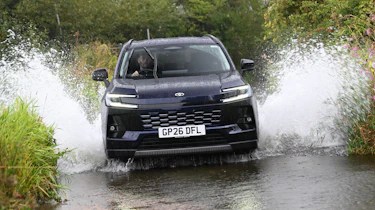 Toyota RAV4 driving through deep water