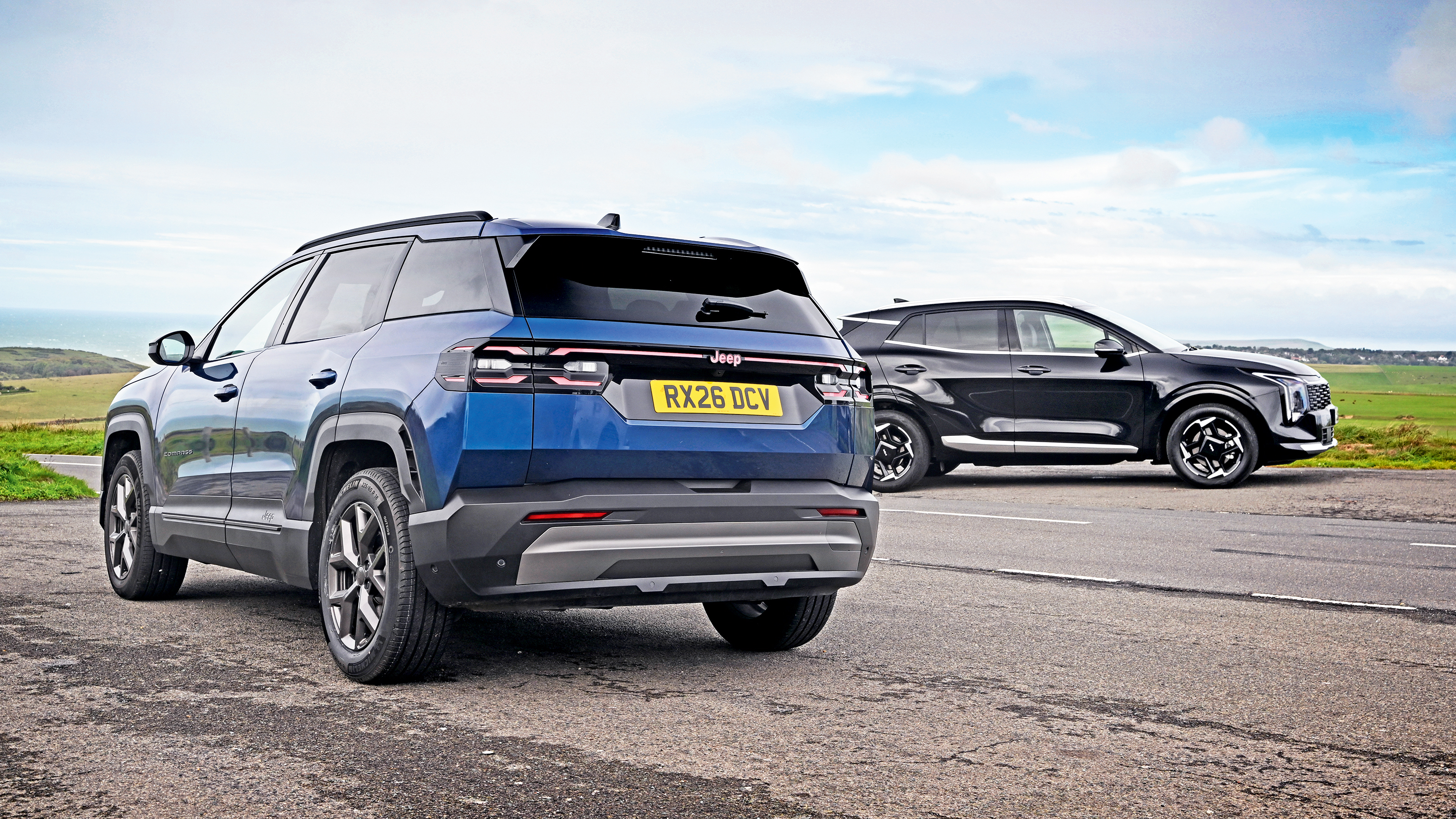 Kia Sportage vs Jeep Compass - static