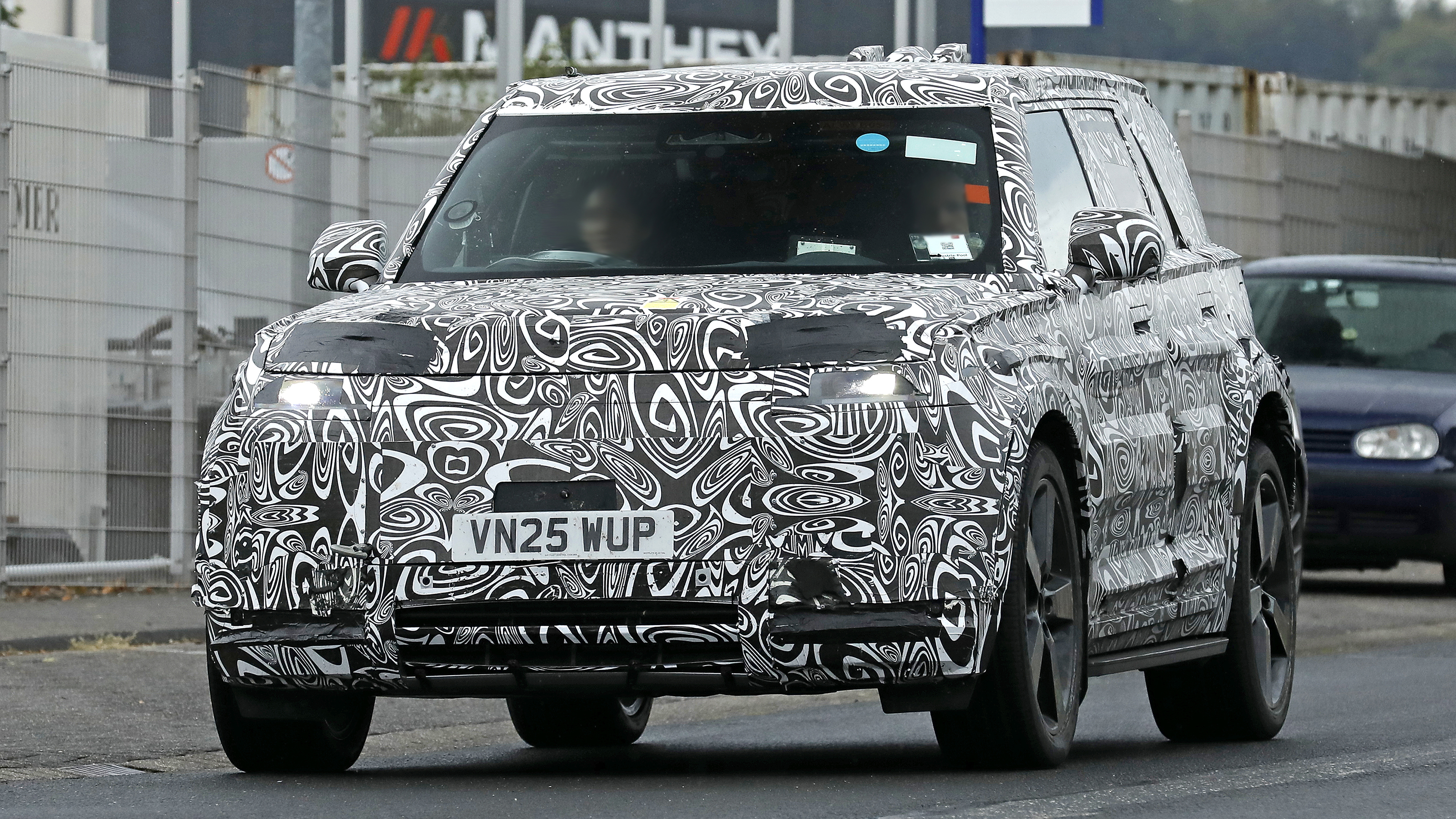 New Land Rover Defender Sport - road front end