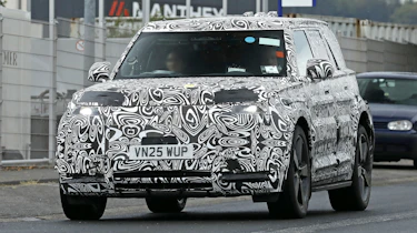 New Land Rover Defender Sport - road front end