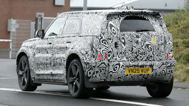 New Land Rover Defender Sport - road rear 3/4