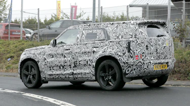 New Land Rover Defender Sport - road rear angled