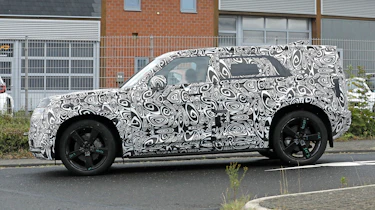 New Land Rover Defender Sport - road side profile