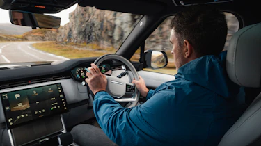 Steve Walker driving the Range Rover Electric