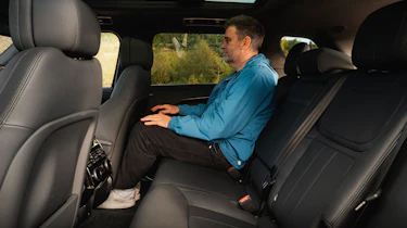 Steve Walker sat in the Range Rover Sport Electric