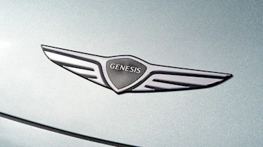 Used Genesis GV60 - badge