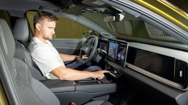 New Volkswagen ID. Tiguan - front interior with Auto Express senior news reporter Alastair Crooks sat insider