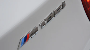 BMW M135i badge