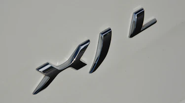 Jaguar XJ L badge