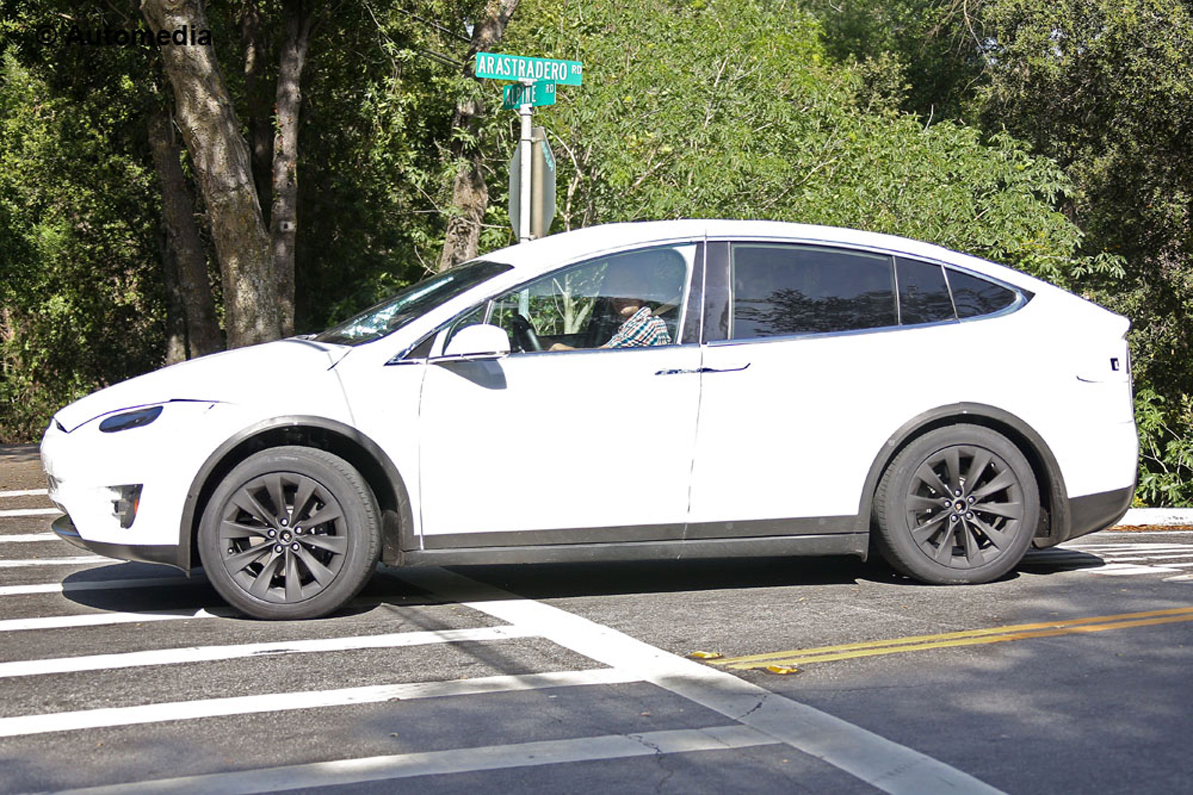 Tesla Model X spyshots side front