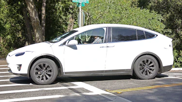 Tesla Model X spyshots side front