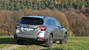 New Subaru Outback 2015 rear grass