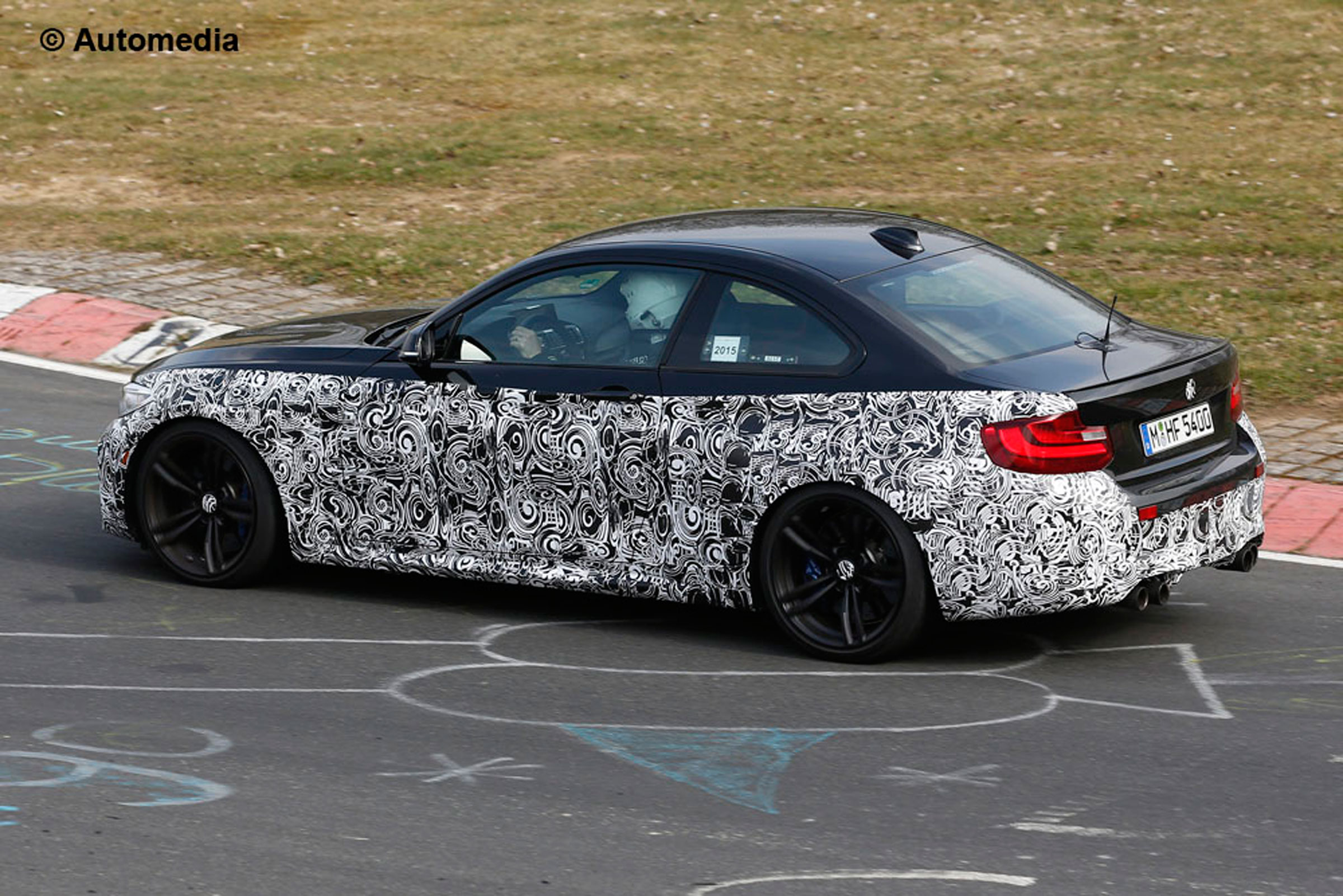BMW M2 spyshots Nurburgring side rear 