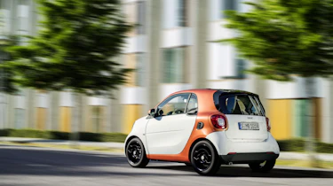 Smart ForTwo - white rear driving