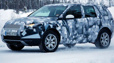 Baby Land Rover Discovery 2014 spy - front quarter