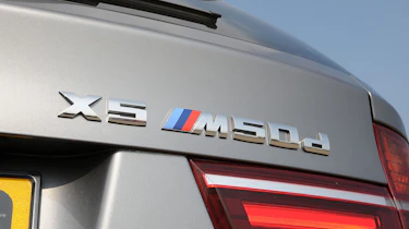 BMW X5 M50d badge