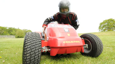 World's fastest lawnmower driven