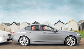 BMW 5-Series header.