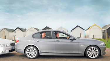 BMW 5-Series header.