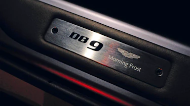 Aston DB9 Volante Morning Frost badge