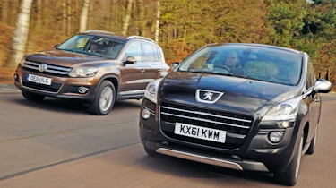 Peugeot 3008 HYbrid4 vs VW Tiguan