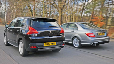 Peugeot 3008 HYbrid4 vs Mercedes C-Class