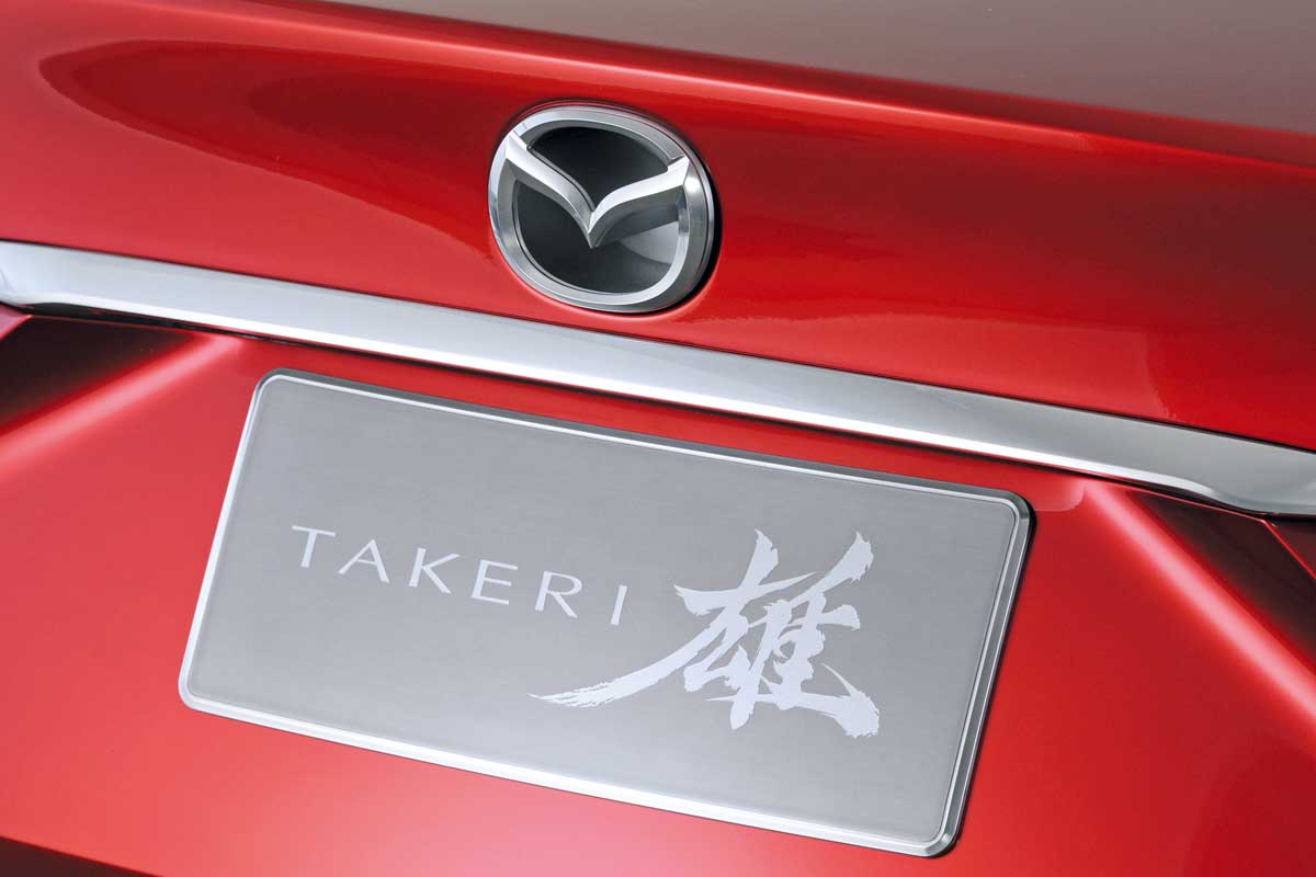 Mazda Takeri badge