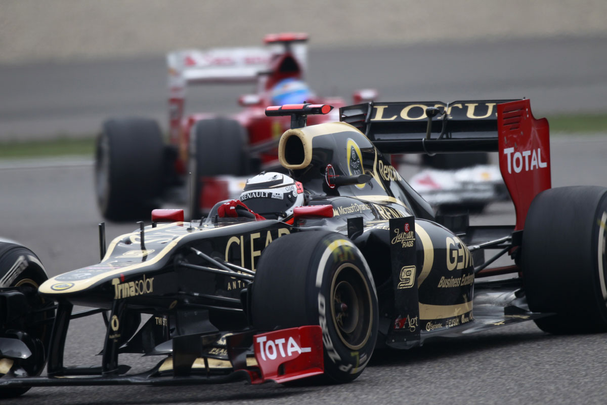 Kimi Raikkonen ahead of Fernando Alonso
