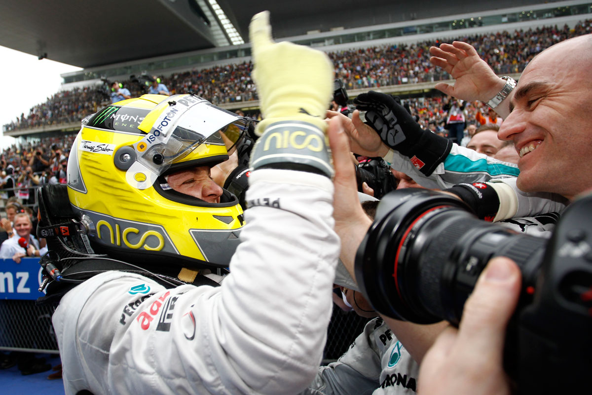 Nico Rosberg celebrates his first win