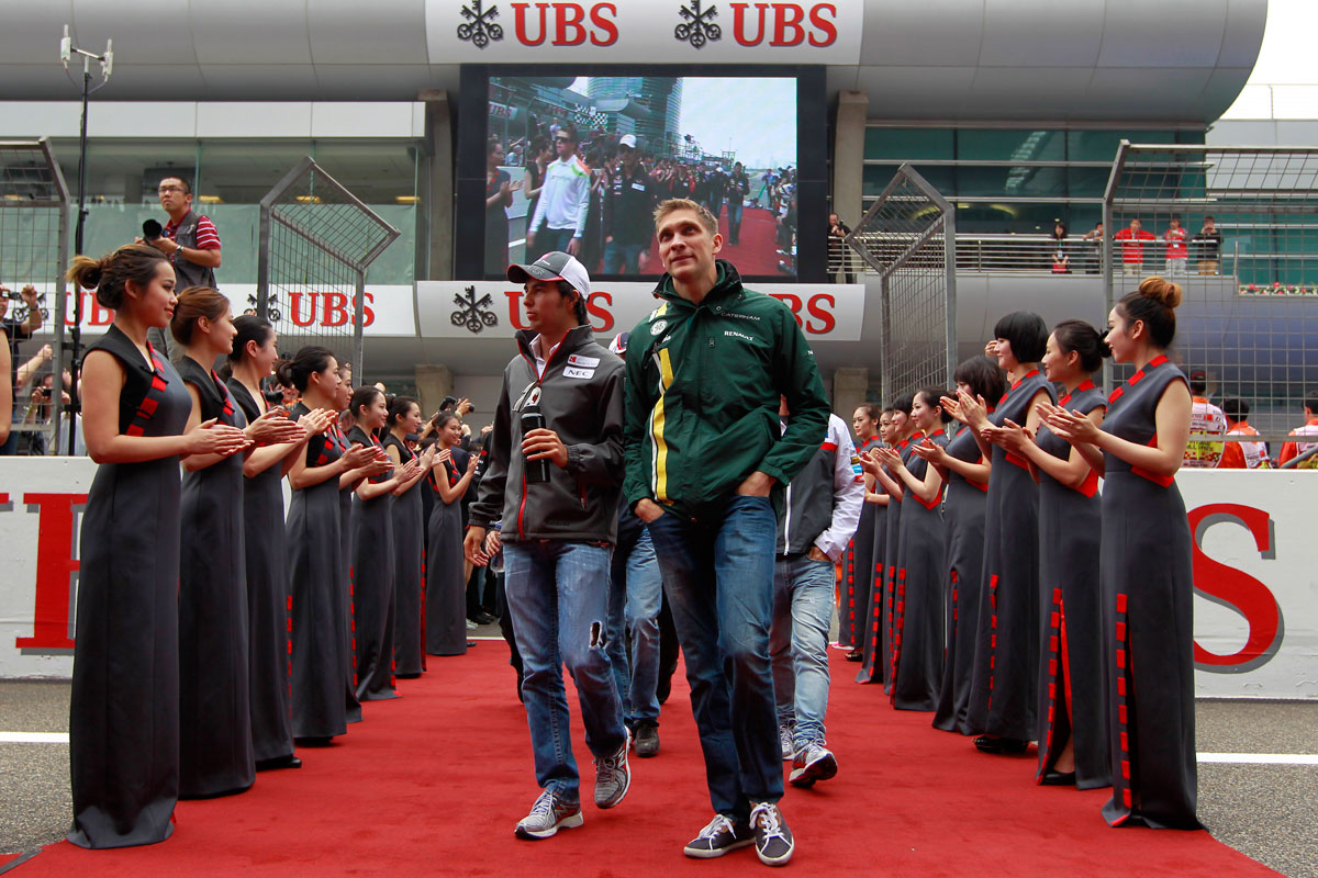 Sergio Perez and Vitaly Petrov after the driver parade