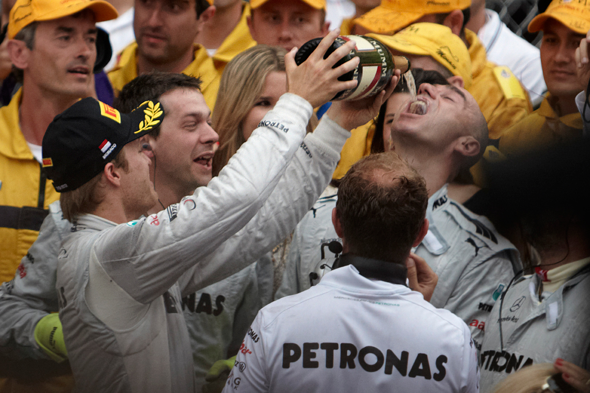 Nico Rosberg celebrates with his team