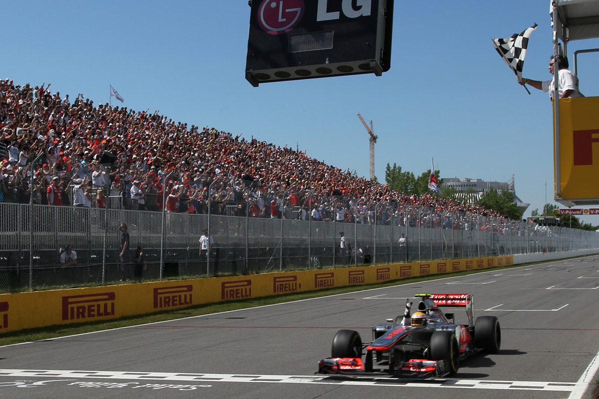 Lewis Hamilton crosses the finish line