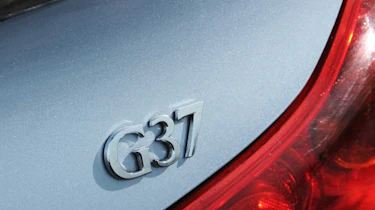 Infiniti G37 badge