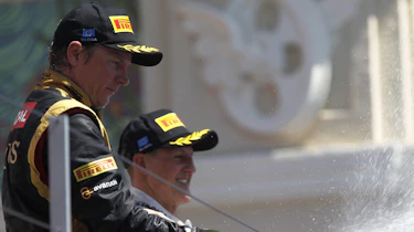 Kimi Raikkonen and Michael Schumacher celebrate
