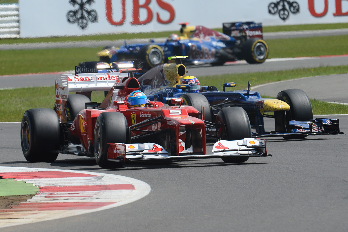 Fernando Alonso leads Mark Webber