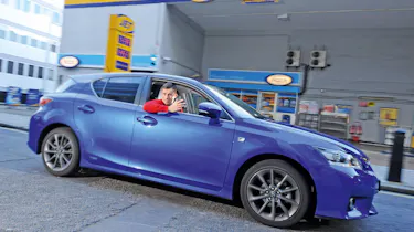 Lexus CT 200h at a petrol station
